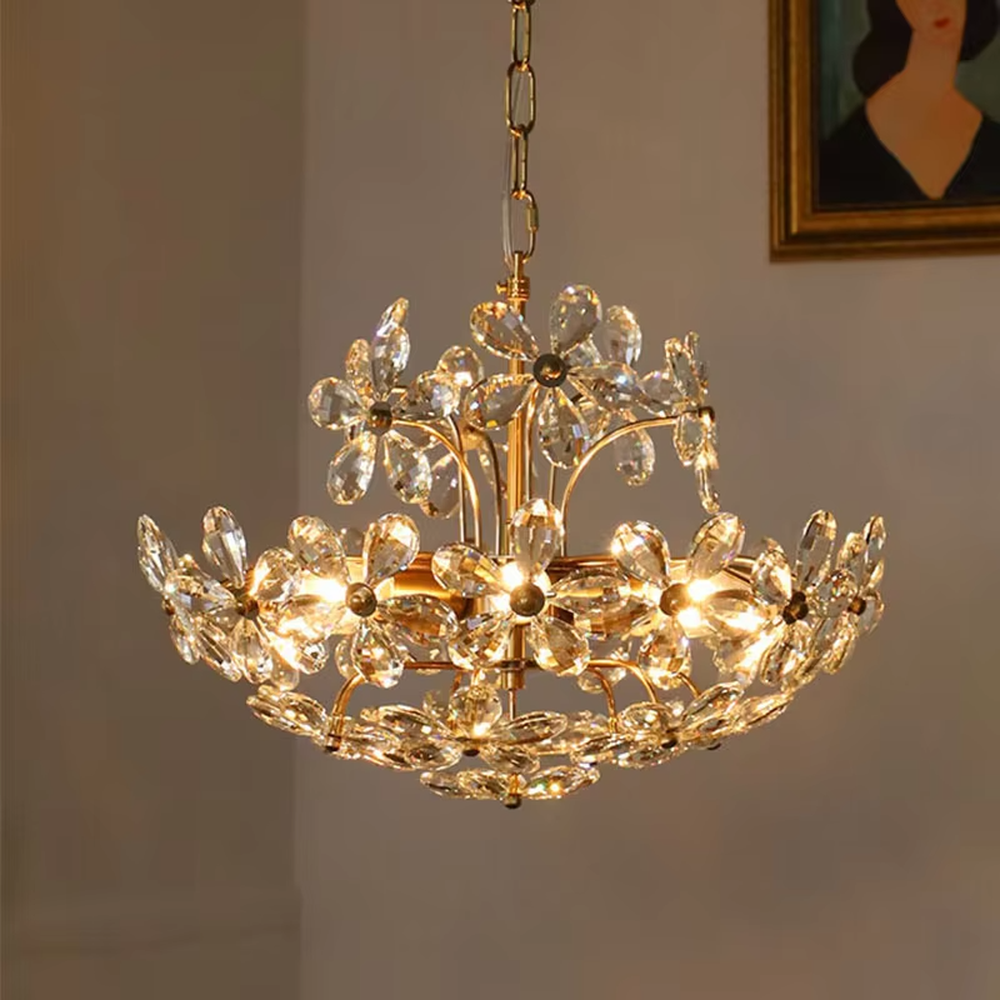 A French light luxury style double-layer crystal petal chandelier, featuring a gold iron frame inlaid with K9 crystal petal decorations. It emits a brilliant and soft glow when lit, combining decorative appeal with practical illumination, ideal for creating a romantic and retro space atmosphere.