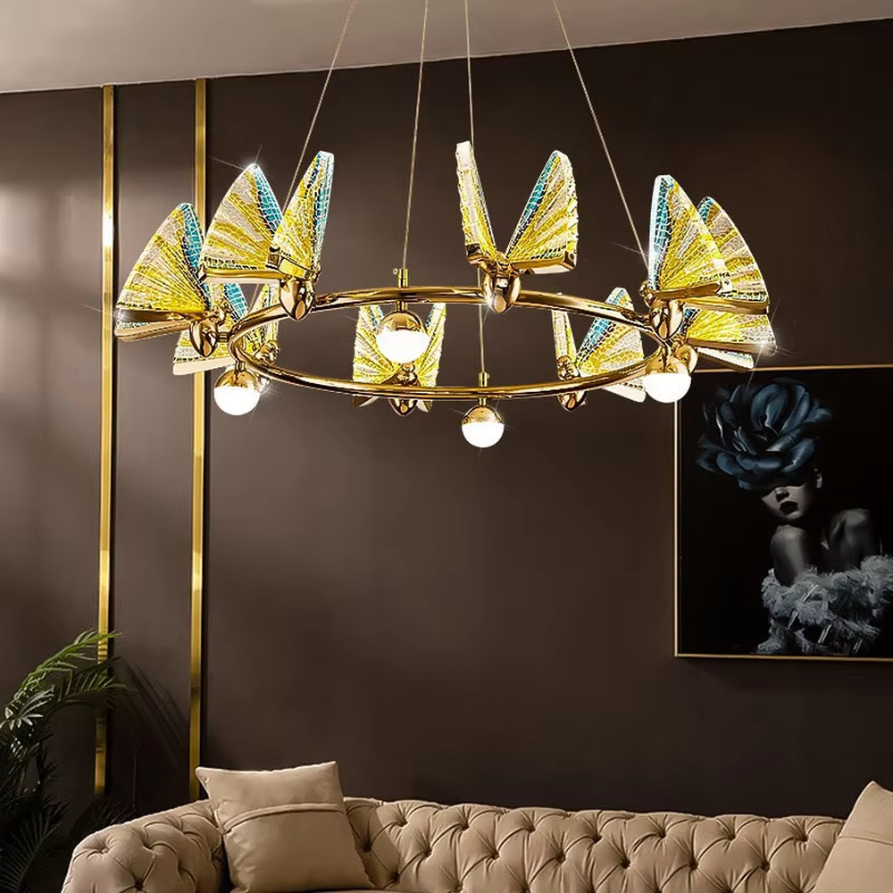 This is a light luxury artistic butterfly wing chandelier, featuring a gold metal circular frame paired with colorful gold glass butterfly wing decorations, with built-in spherical light sources. It emits brilliant and dynamic light, serving both lighting and decorative purposes, suitable for light luxury living rooms, dining rooms, high-end clubs, showrooms and other scenarios.