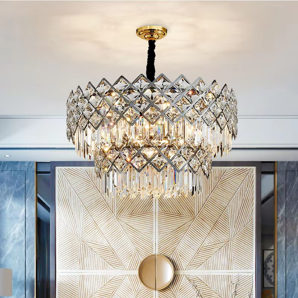 This light luxury rectangular crystal chandelier features a metal frame paired with a rhombus-faceted crystal border and drooping crystal tassels, with light refracting a brilliant halo through the crystals, serving both lighting and decorative purposes, suitable for modern light luxury spaces such as dining rooms and living rooms.