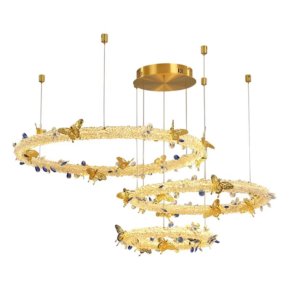 A light luxury and glamorous three-tiered ring chandelier, decorated with crystal gravel, natural blue-veined stone, and gold metal butterflies. Its staggered ring structure resembles flowing cosmic orbits, emitting a brilliant yet soft glow when lit, combining artistic decoration with lighting functionality, ideal for creating a high-end and romantic space atmosphere.