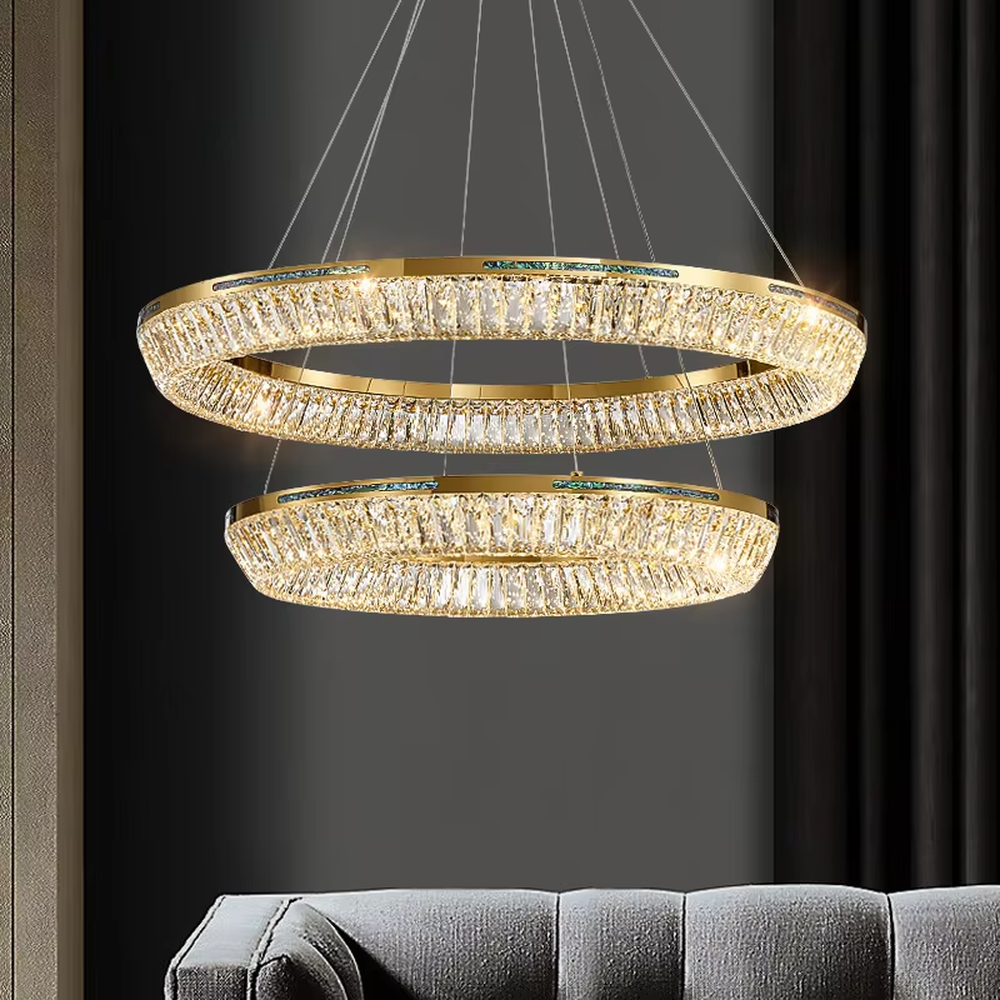 Modern light luxury three-layer ring crystal chandelier, with golden metal frames and transparent crystal lampshades, the staggered suspended shape combines decorative and lighting functions, suitable for high-ceiling living rooms, villas, high-end clubs and other spaces.