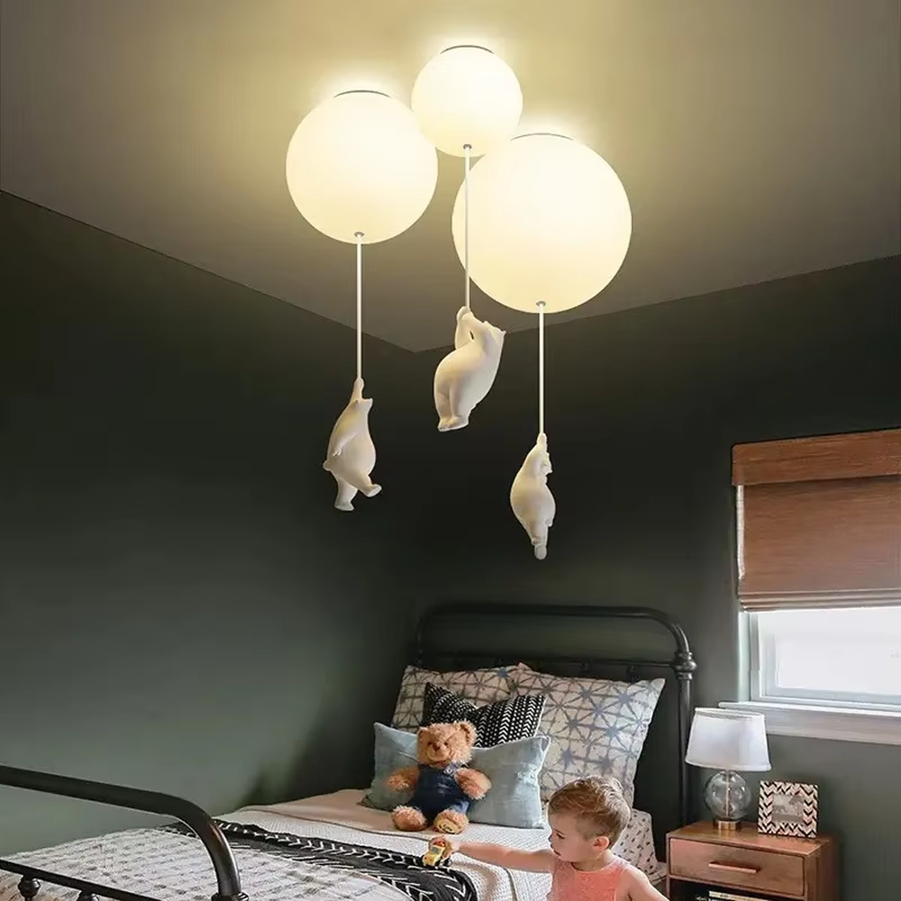 Playful balloon-shaped children's chandelier, with milky white glass ball lampshades and cute little duck pendants, featuring soft and warm light, combining decorative and lighting functions, suitable for children's rooms, parent-child bedrooms and other playful style spaces.