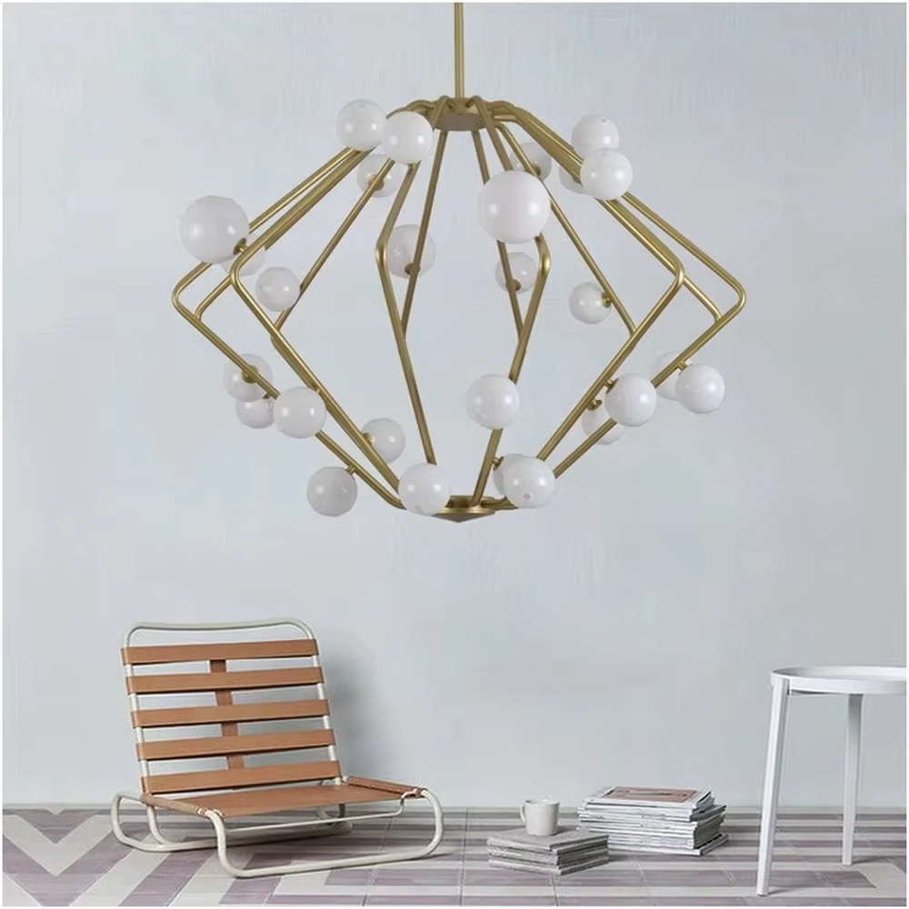 This light luxury rhombus cluster chandelier features a rhombus polyhedron frame made of gold metal, paired with white spherical lampshades, with soft and dreamy light, serving both lighting and decorative purposes, suitable for modern light luxury spaces such as living rooms and dining rooms.