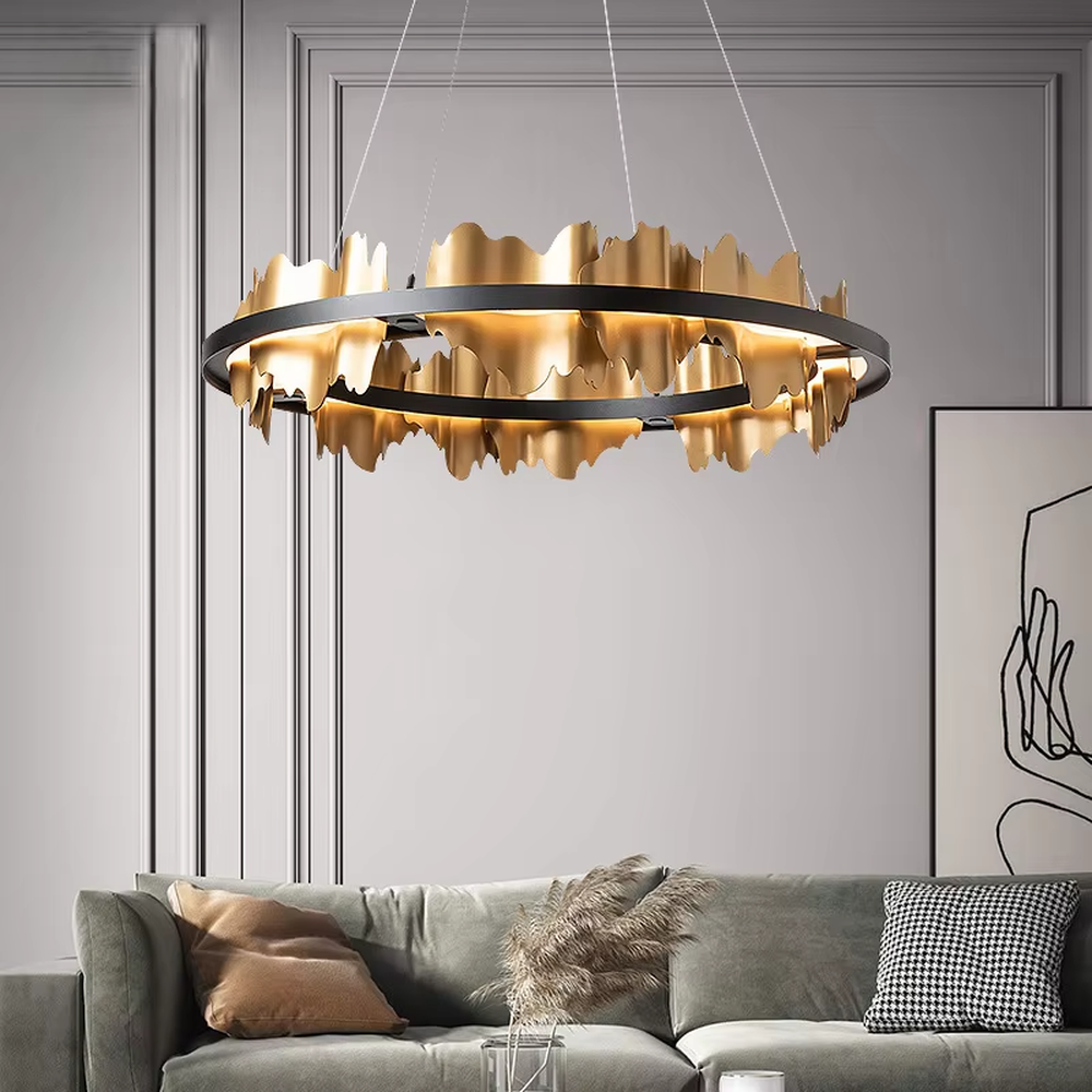 A light luxury and glamorous double-layer ring chandelier, featuring a gold metal frame paired with irregular black hanging glass panels. It emits a brilliant yet soft glow when lit, combining decorative appeal with practical illumination, ideal for creating a high-end and mysterious space atmosphere.