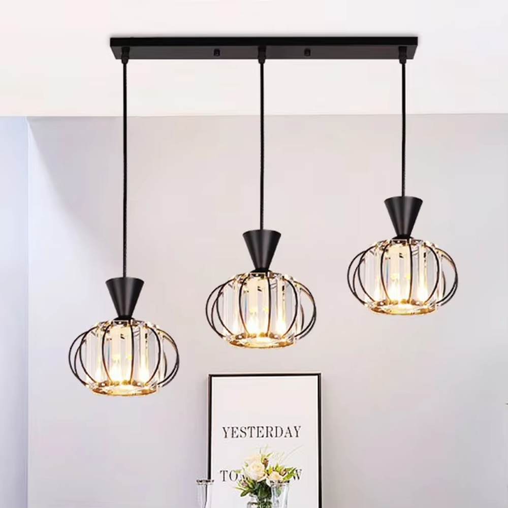 A modern industrial-style 3-head chandelier, featuring a staggered spherical cage frame made of black iron, paired with striped glass lampshades. It emits a soft and transparent glow when lit, combining decorative appeal with practical illumination, ideal for creating a bold and minimalist space atmosphere.