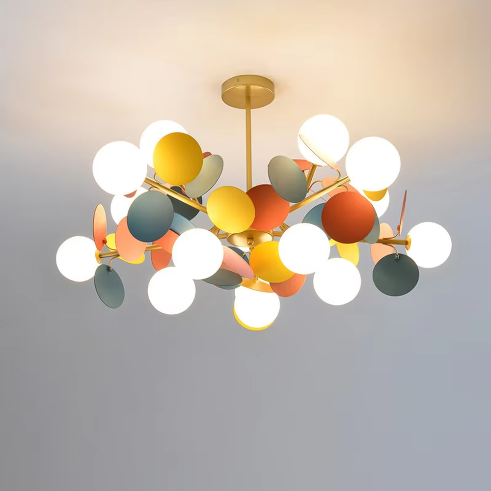 A modern art style branch chandelier, featuring a gold metal frame paired with colorful matte discs and milky white glowing spheres. It emits a soft and warm glow when lit, combining decorative appeal with practical illumination, ideal for creating a lively and soothing space atmosphere.