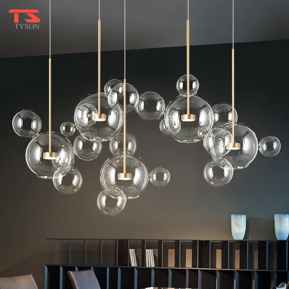 A modern dreamy cloud bubble chandelier, composed of multiple frosted glass balls of varying sizes paired with gold suspension rods. It emits soft and even light when lit, combining decorative appeal with practical illumination, ideal for creating a romantic and soothing space atmosphere.