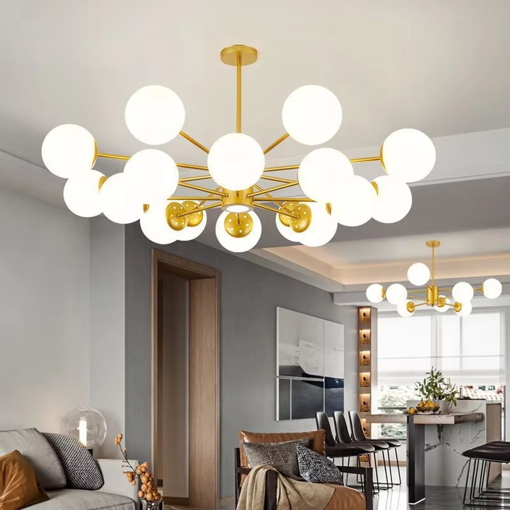 Modern light luxury starry sky molecular ball chandelier, with a golden metal frame paired with milky white frosted glass ball lampshades, shaped like a cluster of interstellar molecules, featuring soft and uniform light, combining decorative and lighting functions, suitable for living rooms, dining rooms, light luxury style spaces.