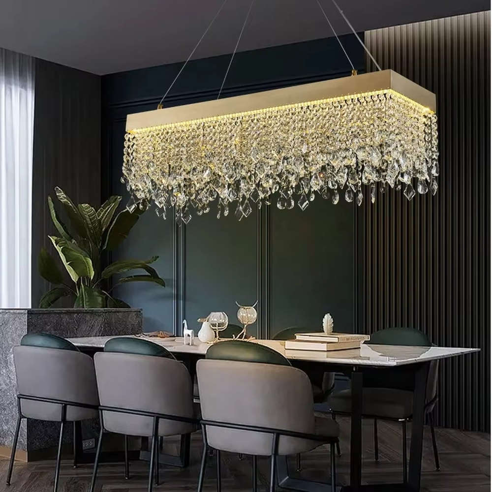This modern light luxury circular tassel crystal chandelier features a champagne gold metal top frame, with dense crystal bead strings hanging down to form a tassel layered shape. When lit, light refracts through the crystals to emit a brilliant and soft glow, combining a luxurious texture with an ambient atmosphere. Ideal for living rooms, dining rooms, light luxury apartments, and other spaces, it adds an exquisite and sophisticated touch to modern minimalist or light luxury home environments.