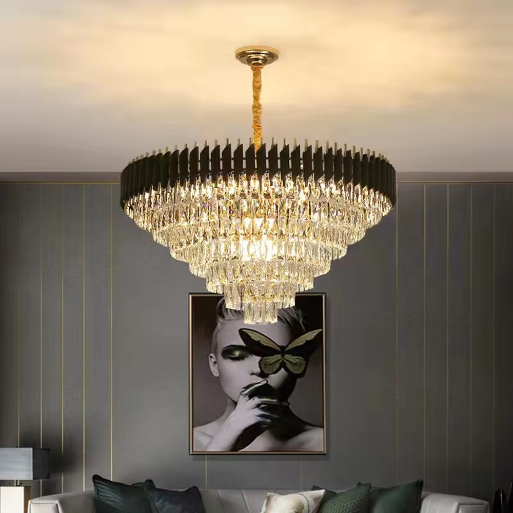 This European luxury multi-layer conical crystal chandelier features an upper frame of gold metal strips and a lower layer of multiple tiers of transparent crystal strips, forming a full conical dome shape. When lit, light refracts through the crystal to emit a brilliant and luxurious glow, combining a luxurious texture with an ambient atmosphere. Ideal for villa living rooms, hotel lobbies, high-end clubs, and other spaces, it adds an elegant and exquisite touch to European luxury or modern light luxury environments.