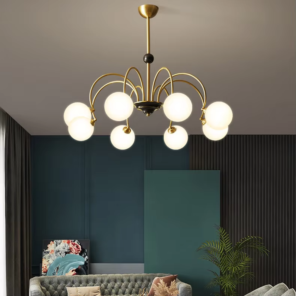 Modern light luxury black and gold magic bean chandelier, featuring curved brackets in black and gold metal paired with milk-white frosted glass ball lampshades. Its rounded, soft, and layered design combines warmth and style, making it a decorative lighting fixture that enhances the space's texture.