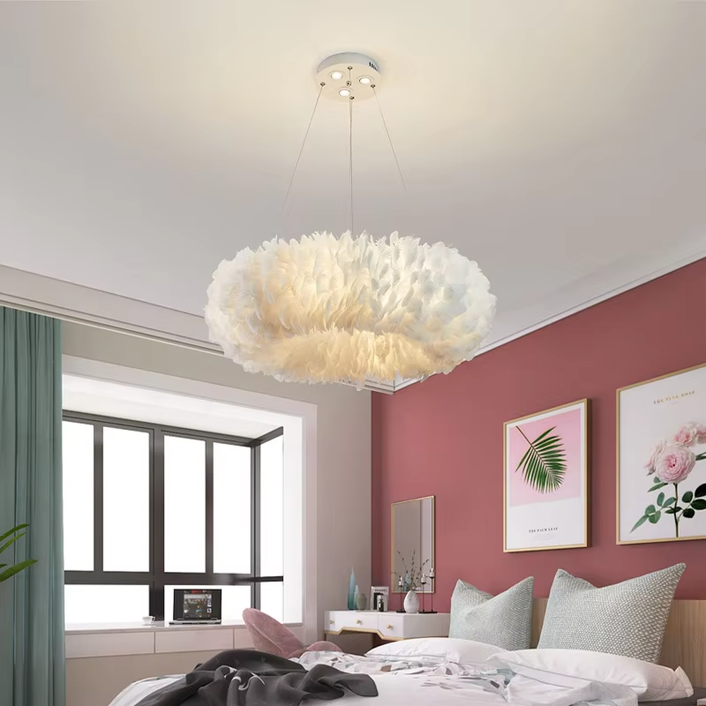 Nordic-style cloud feather chandelier, featuring a fluffy cloud-shaped lampshade made of natural white feathers. It emits soft and gentle light, combining a romantic ambiance and a soothing feel, making it a decorative lighting fixture that enhances the warmth of the space.