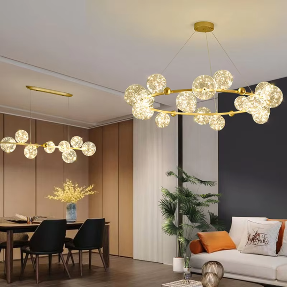 Modern light luxury starry sky ring chandelier, featuring a brass metal ring frame paired with transparent bubble glass balls with built-in lamp beads to form a star cluster shape. It emits bright and translucent light, combining a dreamy feel and elegant ambiance, making it a high-end decorative lighting fixture that elevates the space's style.