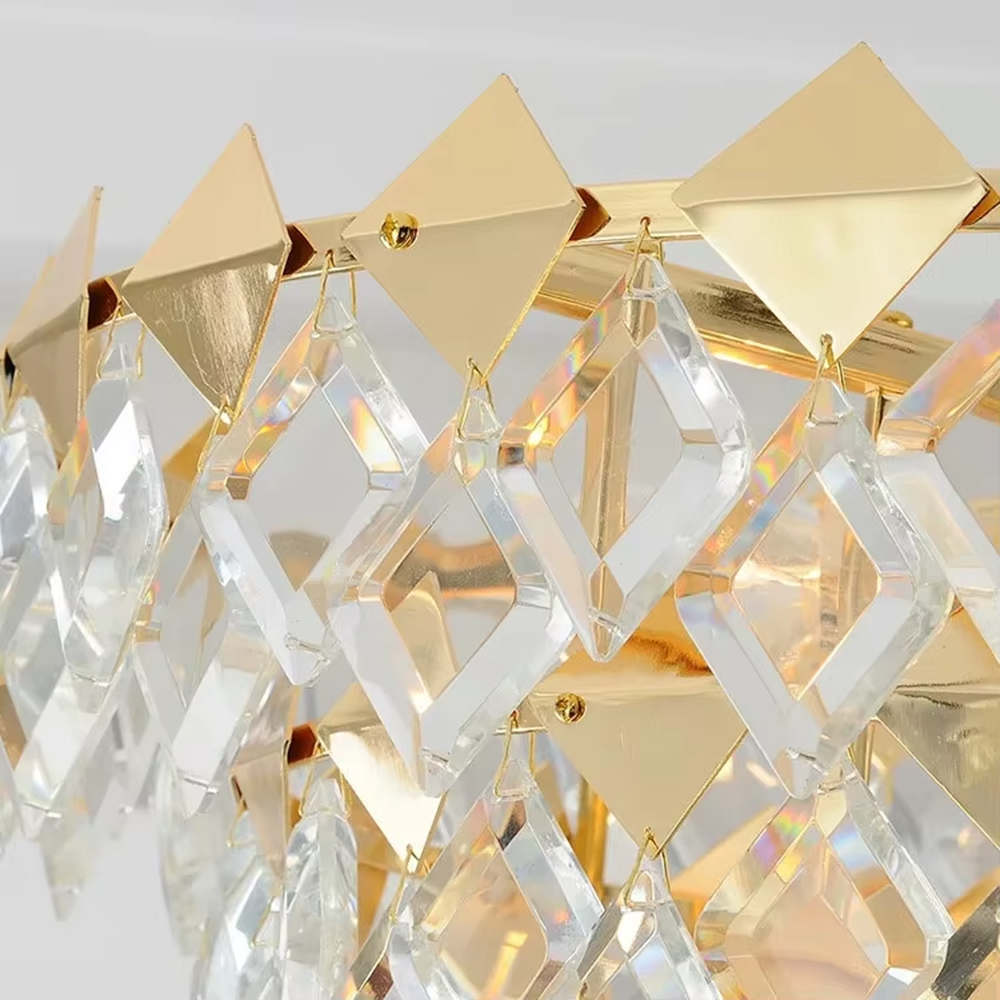 This luxurious and grand diamond-cut crystal chandelier features a gold metal frame, paired with transparent faceted crystals and gold decorative pieces, creating a full spherical shape. When lit, light refracts through the crystal to emit a brilliant and luxurious glow, combining decorative appeal with an ambient atmosphere. Ideal for dining rooms, living rooms, villa high-ceiling spaces, or high-end clubs, it adds an elegant and exquisite touch to European luxury or modern light luxury spaces.
