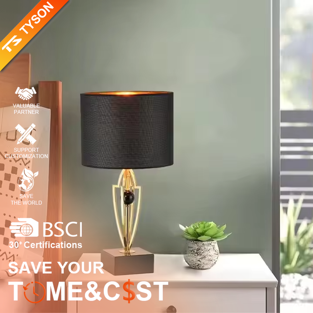 This is a luxurious retro-style table lamp with a golden metal bracket, a black square base, and a black fabric lampshade. It features a grand and elegant design with artistic texture. It is used for local desktop lighting and decoration, creating a luxurious retro ambiance. It is suitable for luxury-style home bedrooms, high-end hotel guest rooms, art exhibition halls and other places.
