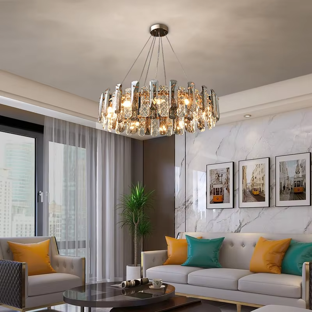 This modern light luxury circular crystal chandelier features a metal frame, inlaid with multi-faceted cut crystal pieces to form a rounded shape. When lit, light refracts through the crystal to emit a brilliant and luxurious glow, combining an exquisite texture with an ambient atmosphere. Ideal for living rooms, dining rooms, light luxury apartments, and other spaces, it adds an exquisite and sophisticated touch to modern minimalist or light luxury home environments.