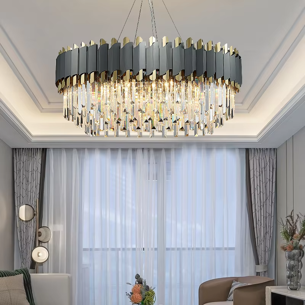 This modern light luxury two-layer linear chandelier features an upper frame of pink-and-gold geometric metal pieces, with transparent crystal tassels hanging below, suspended by a gold ceiling base and silver cords. When lit, light refracts through the crystal to emit a brilliant and soft glow, combining a sweet texture with an ambient atmosphere. Ideal for dining rooms, bars, girl-style bedrooms, and other spaces, it adds an exquisite and sophisticated touch to modern minimalist or light luxury sweet home environments.