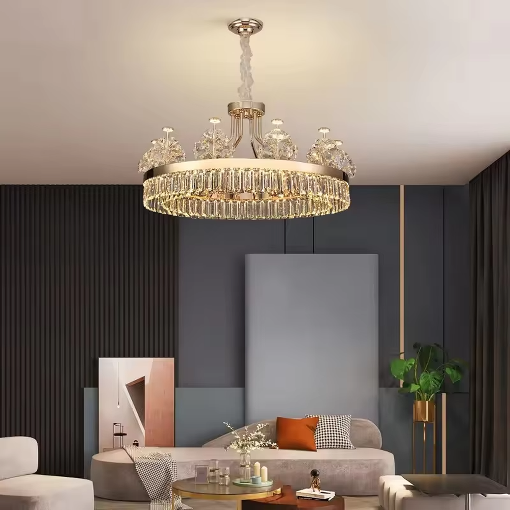 This modern light luxury two-layer crystal chandelier features a gold metal frame, with dense transparent long crystals hanging below and leaf-textured crystal lampshades on top. When lit, light refracts through the crystal to emit a brilliant and soft glow, combining an ethereal texture with an ambient atmosphere. Ideal for living rooms, dining rooms, light luxury apartments, and other spaces, it adds an exquisite and sophisticated touch to modern minimalist or light luxury home environments.