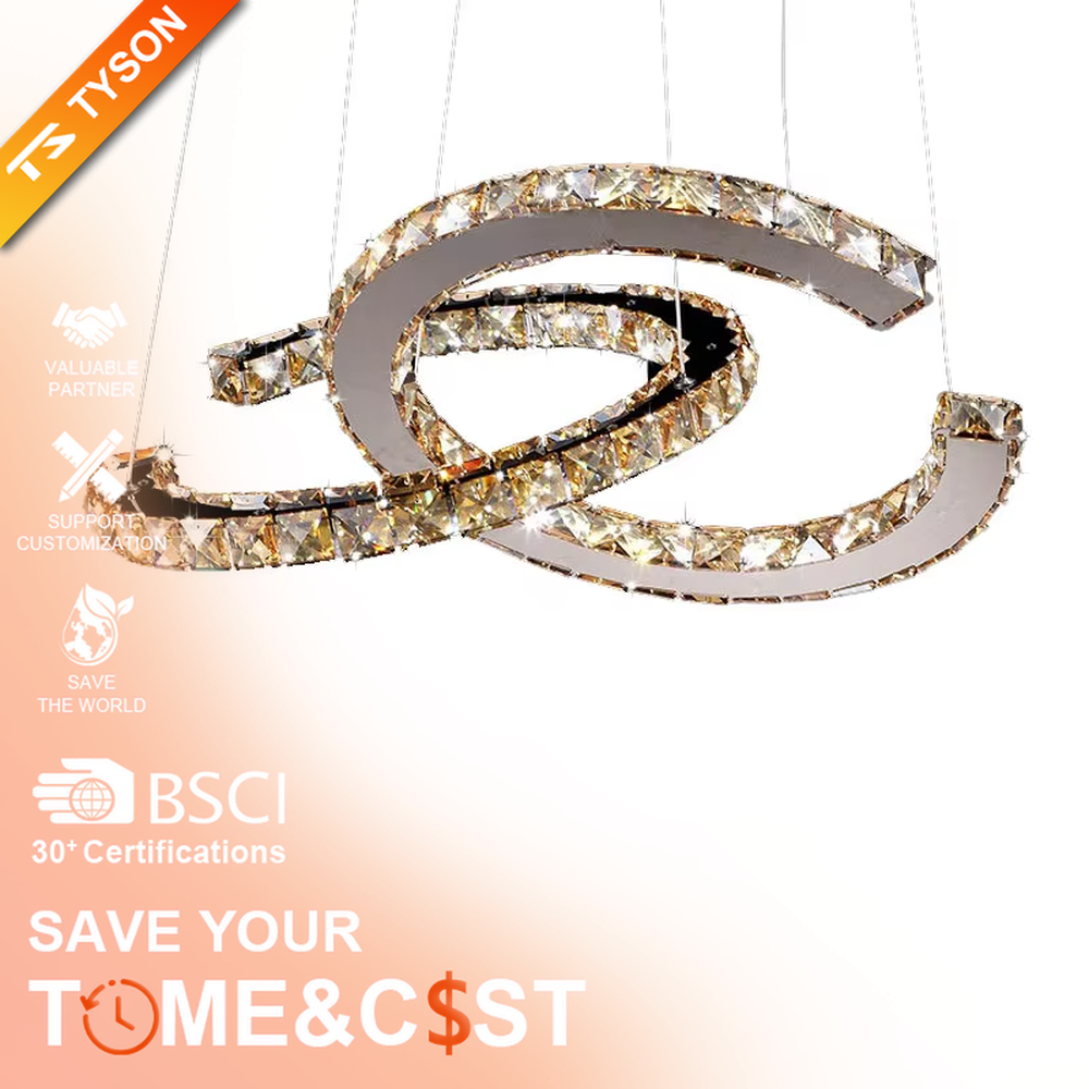 This modern light luxury interwoven ring crystal chandelier consists of multiple crystal-embedded metal rings interlaced and nested, suspended by silver cords. When lit, light refracts through the crystal to emit a brilliant and dynamic glow, combining a futuristic feel with an ambient atmosphere. Ideal for bedrooms, living rooms, light luxury apartments, and other spaces, it adds an exquisite and sophisticated touch to modern minimalist or light luxury home environments.
