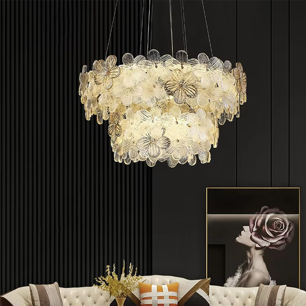 This modern light luxury linear petal chandelier features a full linear shape made of transparent petal-shaped glass slices. When lit, light refracts through the glass to emit a soft and brilliant glow, combining an ethereal texture with an ambient atmosphere. Ideal for dining rooms, bars, light luxury apartments, and other spaces, it adds a dreamy and exquisite touch to modern minimalist or French light luxury home environments.