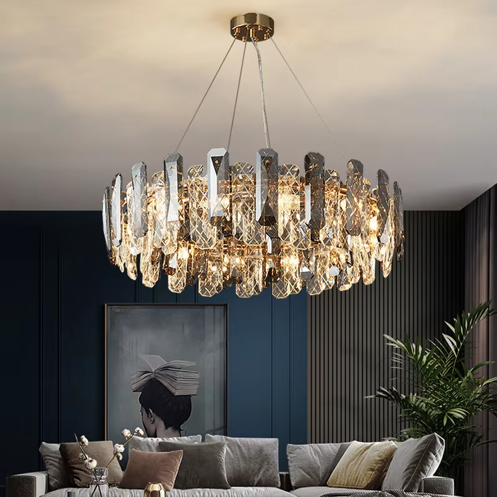 This modern light luxury circular crystal chandelier features a metal frame, inlaid with multi-faceted cut crystal pieces to form a rounded shape. When lit, light refracts through the crystal to emit a brilliant and luxurious glow, combining an exquisite texture with an ambient atmosphere. Ideal for living rooms, dining rooms, light luxury apartments, and other spaces, it adds an exquisite and sophisticated touch to modern minimalist or light luxury home environments.
