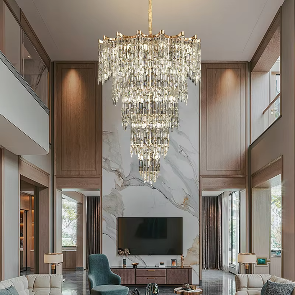 This European luxury fan-shaped crystal chandelier features a champagne gold metal frame, with dense long crystals hanging down to form a layered fan shape, suspended by a braided cord. When lit, light refracts through the crystal to emit a brilliant and luxurious glow, combining a luxurious texture with an ambient atmosphere. Ideal for villa living rooms, luxury dining rooms, high-end clubs, and other spaces, it adds an elegant and exquisite touch to European luxury or modern light luxury environments.