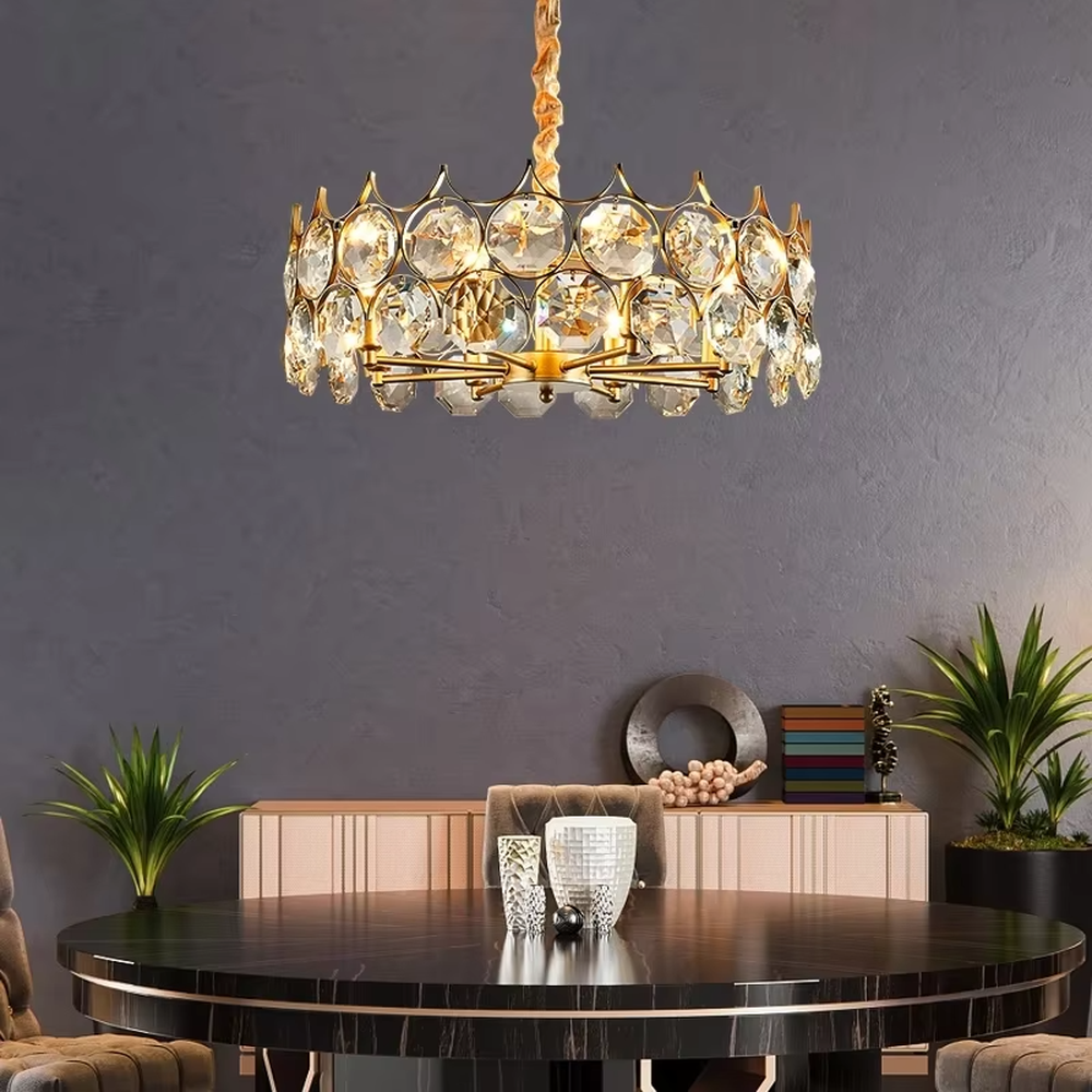 This modern light luxury linear crystal chandelier features a gold metal frame, inlaid with two layers of round-cut crystal slices, suspended by a braided cord. When lit, light refracts through the crystal to emit a brilliant and soft glow, combining a retro-exquisite texture with an ambient atmosphere. Ideal for dining rooms, bars, light luxury apartments, and other spaces, it adds an exquisite and sophisticated touch to modern minimalist or French light luxury home environments.