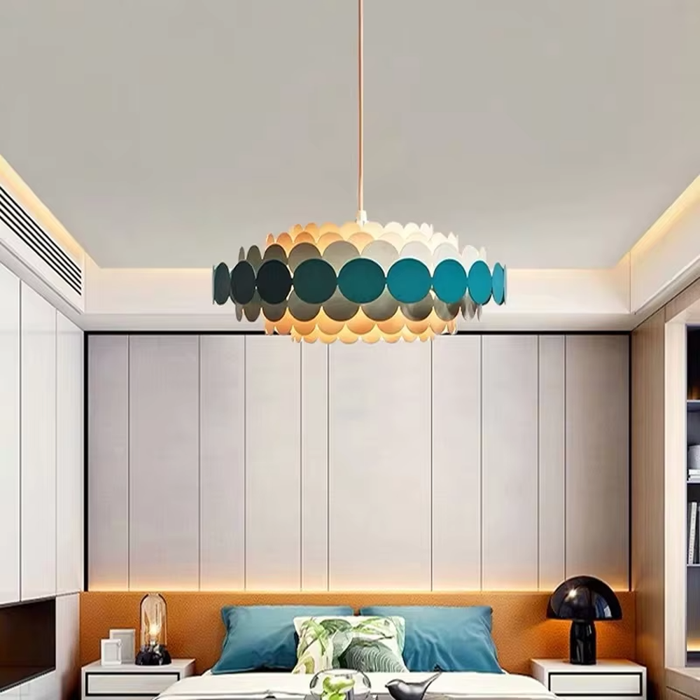 Nordic pop-style gradient disc chandelier, featuring an oval lampshade made of layered colorful discs with a gradient from light beige to deep teal. Light passes through the discs to create soft, gradient lighting effects, combining playfulness and artistry, making it a decorative lighting fixture that enhances space vitality.
