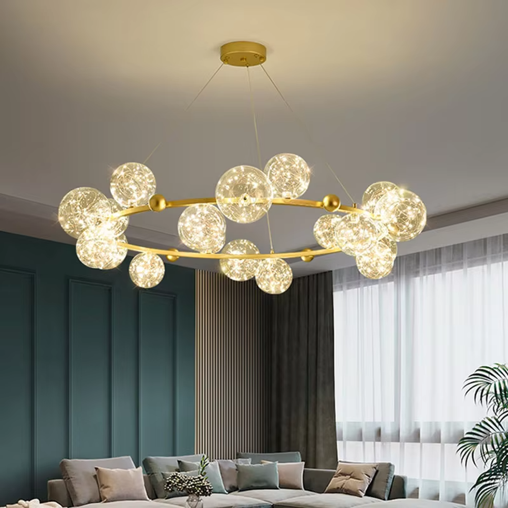 Modern light luxury starry sky ring chandelier, featuring a brass metal ring frame paired with transparent bubble glass balls with built-in lamp beads to form a star cluster shape. It emits bright and translucent light, combining a dreamy feel and elegant ambiance, making it a high-end decorative lighting fixture that elevates the space's style.