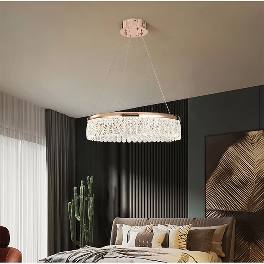 Modern light luxury double-layer ring crystal chandelier, featuring a rose gold metal frame paired with dense crystal strips to create a double-layer suspended shape. Light refracts through the crystals to produce a brilliant and soft glow, combining sophistication and ambiance, making it a high-end decorative lighting fixture that elevates the space's style.