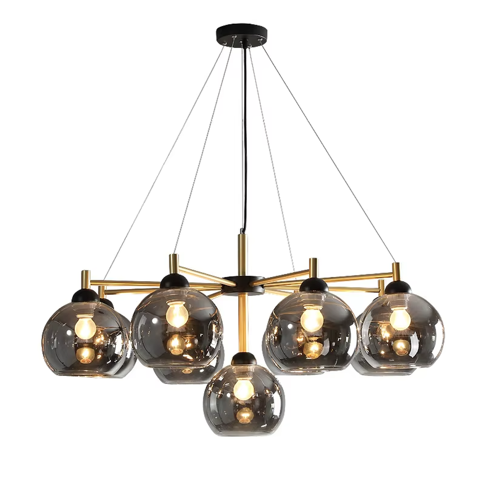 Modern light luxury black and gold branch chandelier, featuring a radial frame in black and gold metal paired with gradient smoky gray glass ball lampshades. Its sophisticated and layered design combines style and ambiance, making it a high-end decorative lighting fixture that elevates the space's aesthetic.