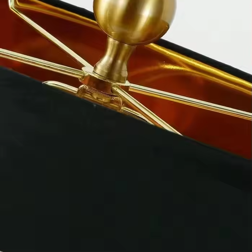 This is a luxurious retro-style table lamp with a golden circular base, a black fabric lampshade, and crystal elements, featuring an elegant and grand design. It is used for local desktop lighting and decoration, enhancing the luxurious retro ambiance of the space. It is suitable for luxury-style home living room side tables, high-end hotel guest rooms, retro-style clubs and other places.