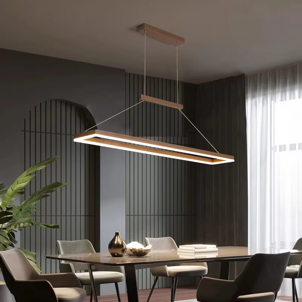 Modern minimalist wood-grain double-layer linear chandelier, featuring a double-layer rectangular frame made of wood-grain metal with built-in soft LED lighting. Its clean and elegant lines combine illumination and decoration, making it a modern home lighting fixture that enhances the space's texture.