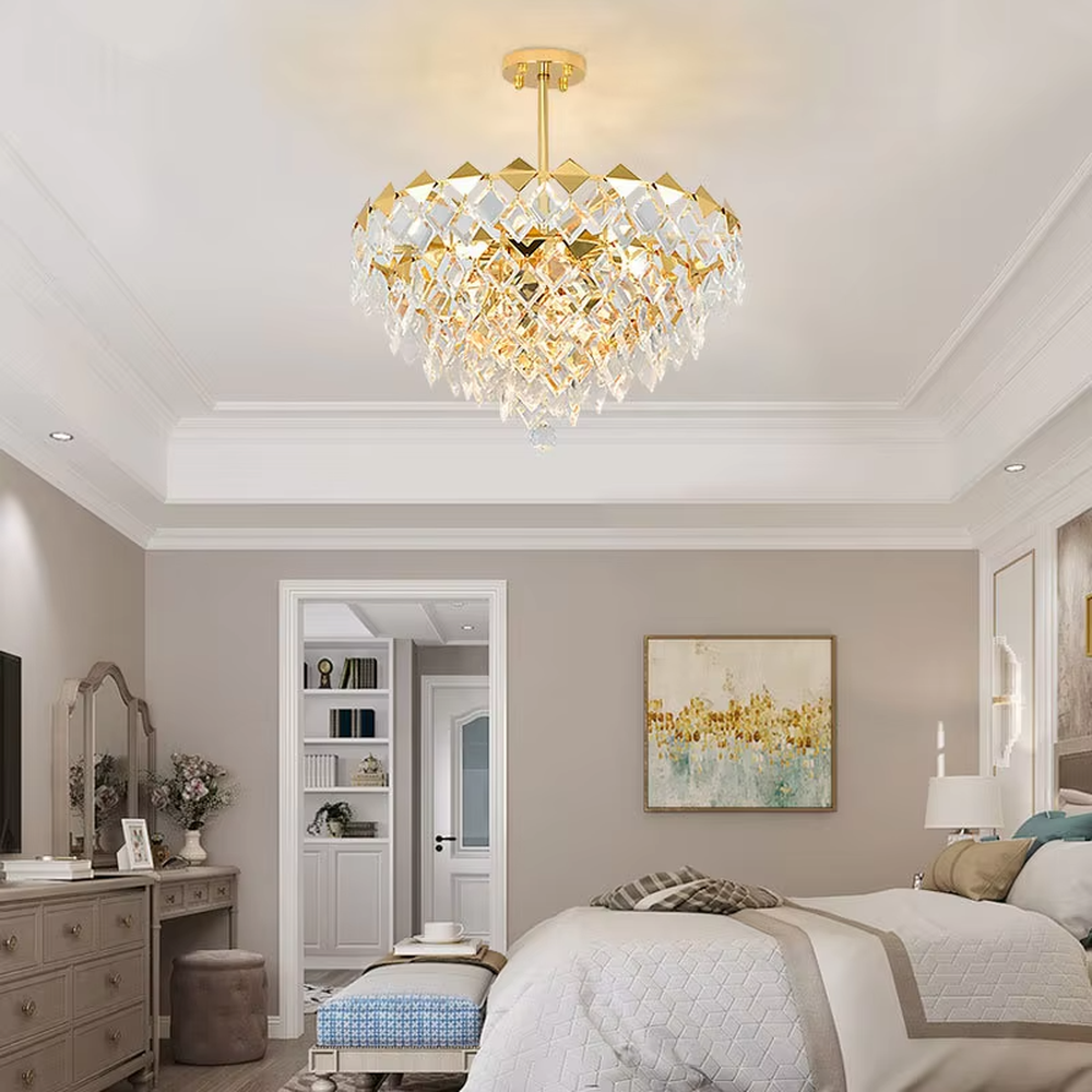 This luxurious and grand diamond-cut crystal chandelier features a gold metal frame, paired with transparent faceted crystals and gold decorative pieces, creating a full spherical shape. When lit, light refracts through the crystal to emit a brilliant and luxurious glow, combining decorative appeal with an ambient atmosphere. Ideal for dining rooms, living rooms, villa high-ceiling spaces, or high-end clubs, it adds an elegant and exquisite touch to European luxury or modern light luxury spaces.