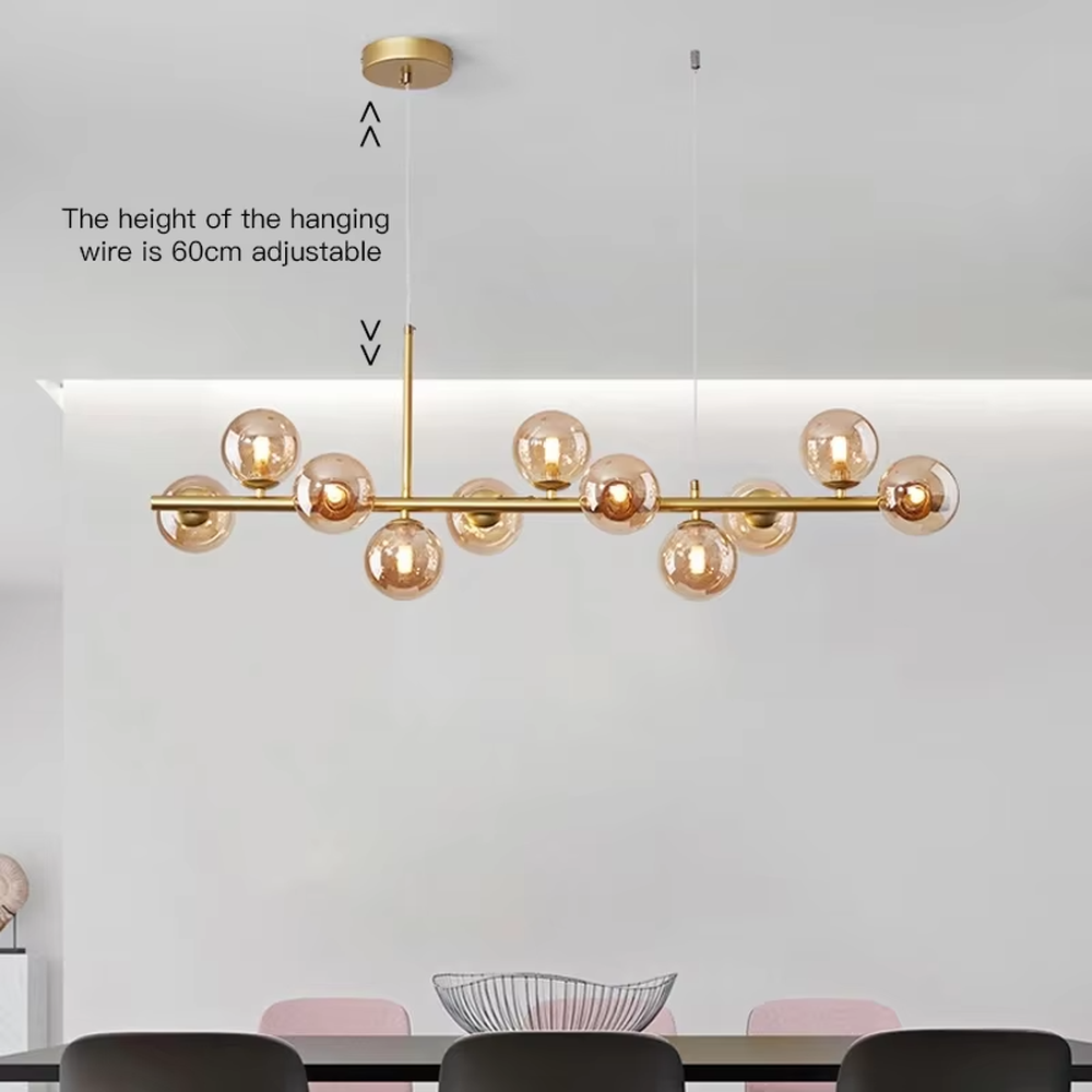 Modern light luxury gradient glass ball linear chandelier, featuring a black metal frame paired with gradient smoky gray glass ball lampshades. Its minimalist and layered design combines style and ambiance, making it a decorative lighting fixture that elevates the space's aesthetic.