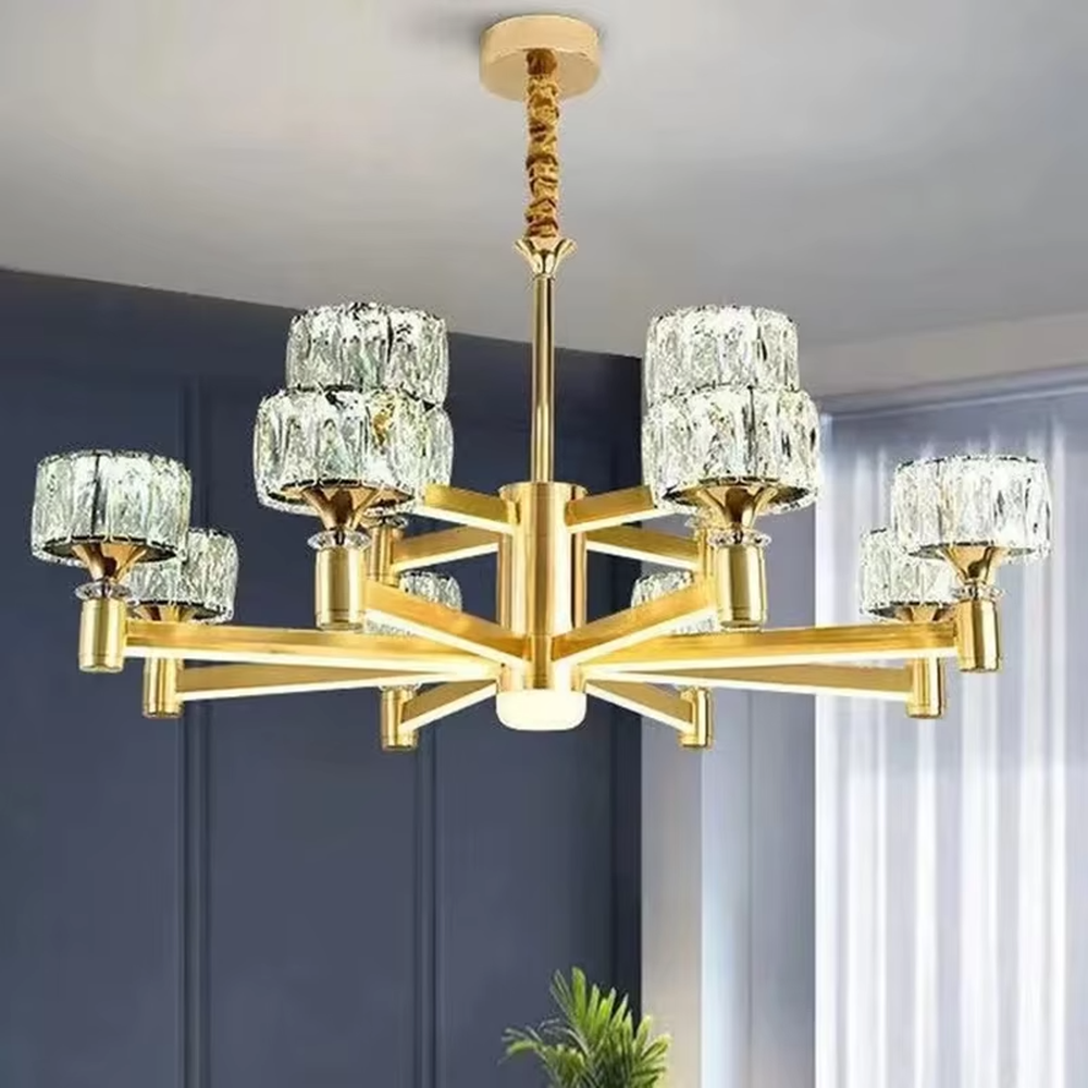 This modern light luxury multi-head chandelier features a gold metal frame, with textured glass lampshades forming a radial shape. When lit, light refracts through the glass to emit a soft and brilliant glow, combining an exquisite texture with an ambient atmosphere. Ideal for living rooms, dining rooms, light luxury apartments, and other spaces, it adds an exquisite and sophisticated touch to modern minimalist or light luxury home environments.
