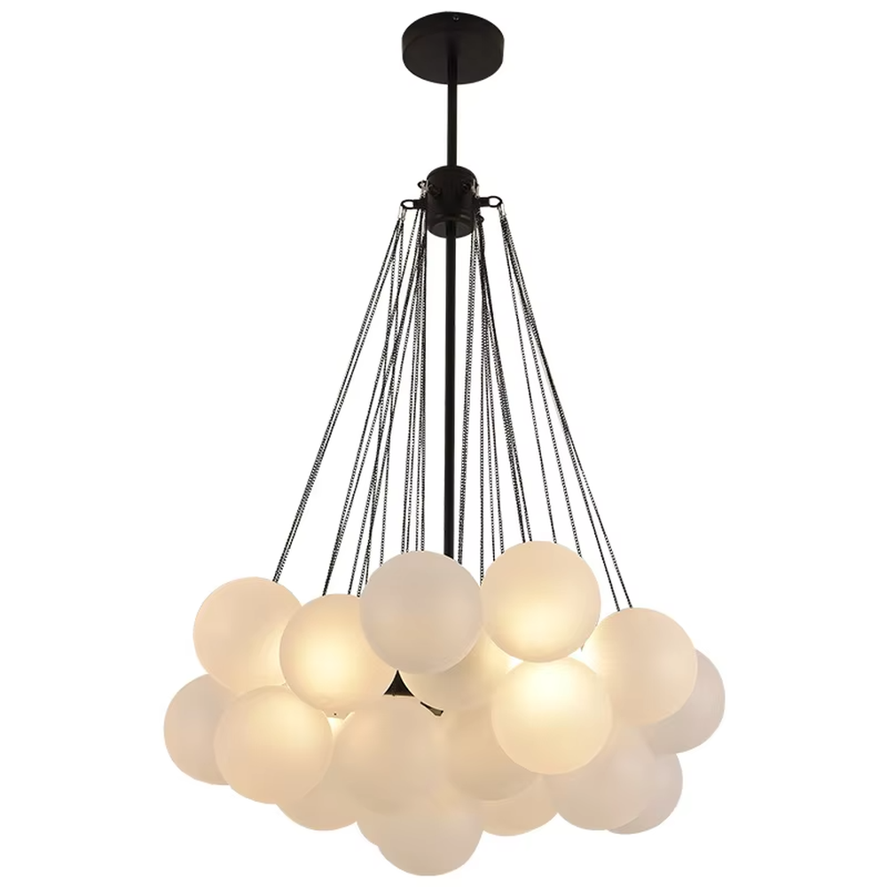 This modern light luxury milk-white cluster chandelier features a gold metal frame, paired with multiple milky white frosted glass ball lampshades arranged in a cloud-like staggered layout. When lit, it emits a soft and gentle glow, combining romantic ambiance with design appeal. Ideal for living rooms, dining rooms, bedrooms, and other spaces, it adds a warm and exquisite touch to modern light luxury, Nordic, or minimalist home environments.