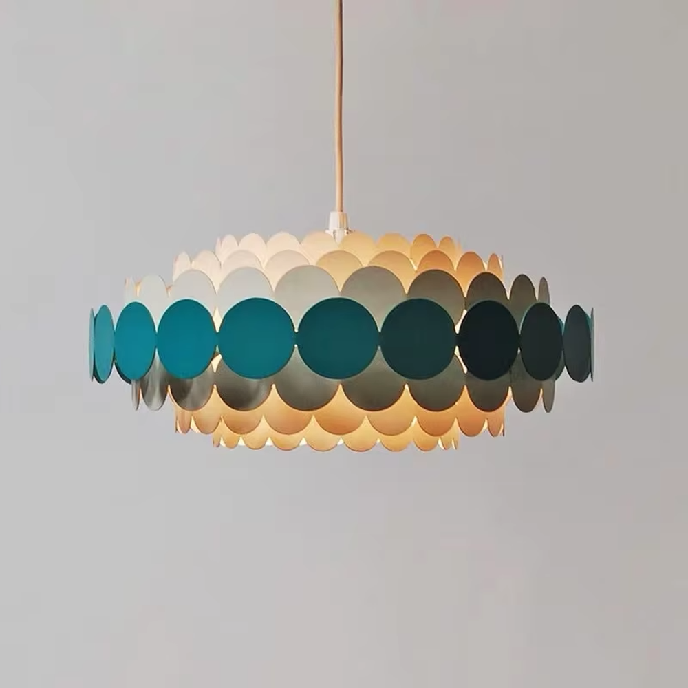 Nordic pop-style gradient disc chandelier, featuring an oval lampshade made of layered colorful discs with a gradient from light beige to deep teal. Light passes through the discs to create soft, gradient lighting effects, combining playfulness and artistry, making it a decorative lighting fixture that enhances space vitality.