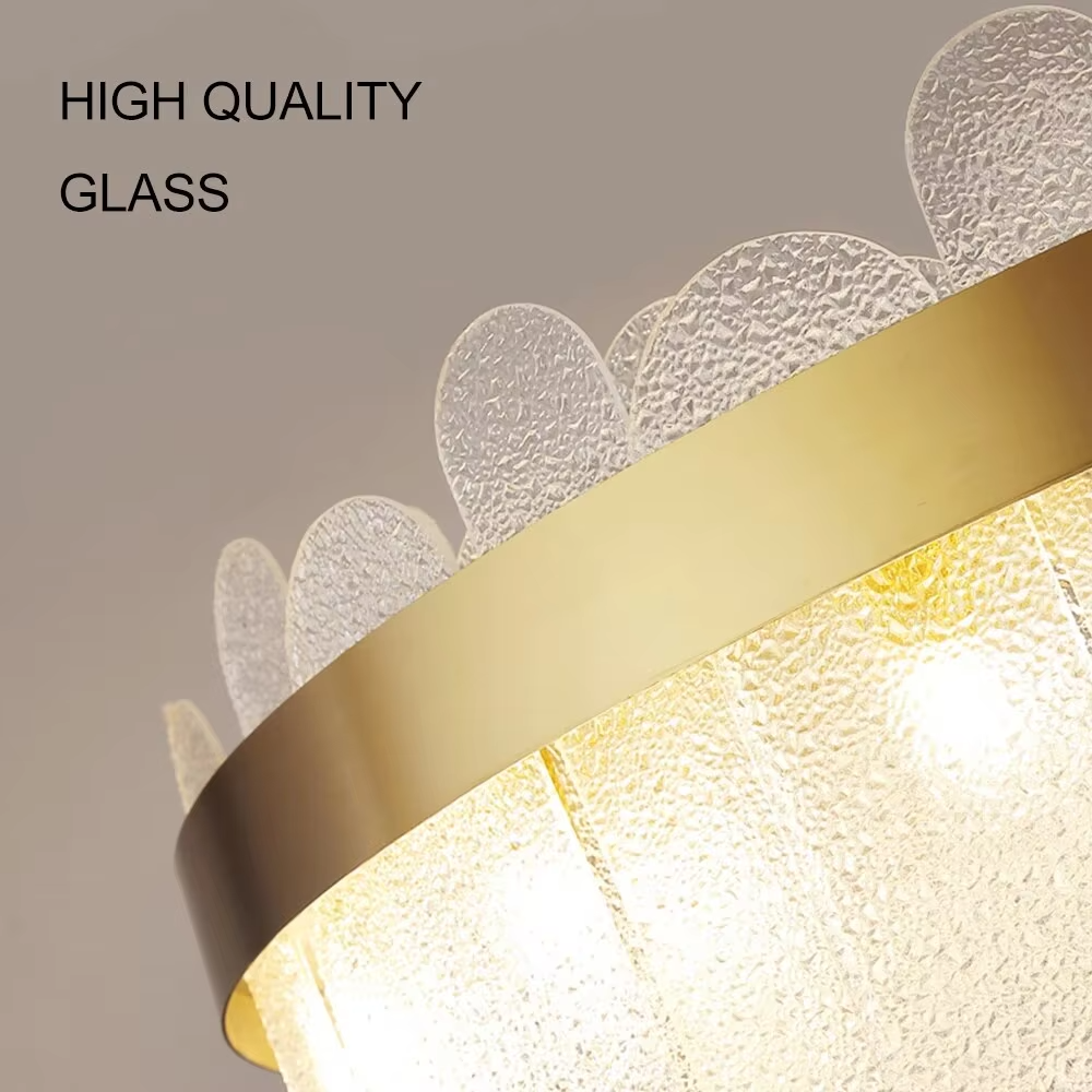 Modern light luxury smoky gray glass chandelier, featuring a ring frame in gold metal paired with layered smoky gray curved glass panels. Light refracts through the glass to create a soft and translucent glow, combining sophistication and ambiance, making it a decorative lighting fixture that elevates the space's style.
