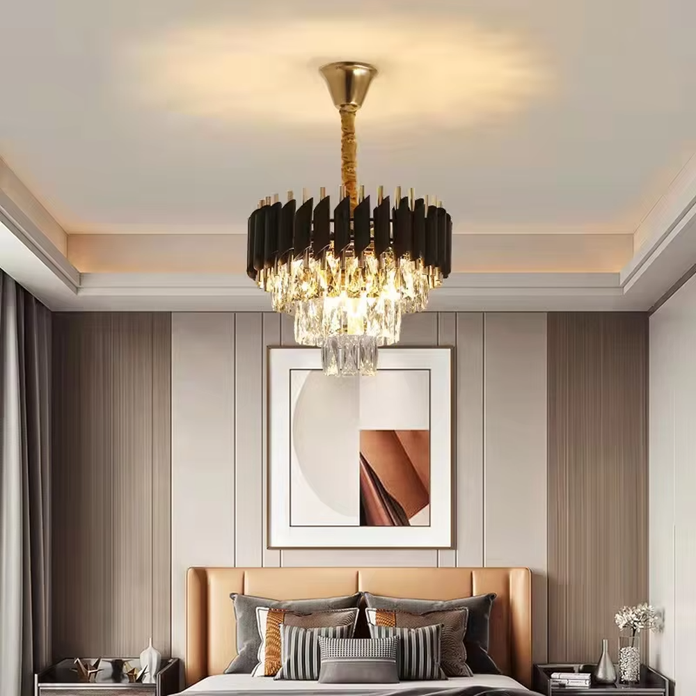 This European luxury multi-layer conical crystal chandelier features an upper frame of gold metal strips and a lower layer of multiple tiers of transparent crystal strips, forming a full conical dome shape. When lit, light refracts through the crystal to emit a brilliant and luxurious glow, combining a luxurious texture with an ambient atmosphere. Ideal for villa living rooms, hotel lobbies, high-end clubs, and other spaces, it adds an elegant and exquisite touch to European luxury or modern light luxury environments.