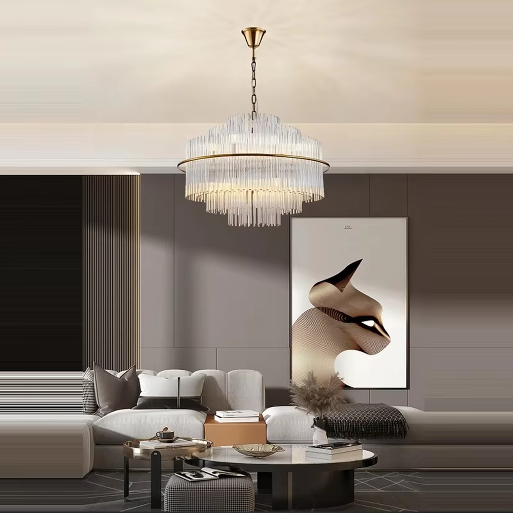 This modern light luxury multi-layer circular crystal chandelier features a gold metal frame, with multiple tiers of transparent long crystals hanging down to form a full circular shape, suspended by a gold chain. When lit, light refracts through the crystal to emit a brilliant and soft glow, combining a luxurious texture with an ambient atmosphere. Ideal for bedrooms, living rooms, light luxury apartments, and other spaces, it adds an exquisite and sophisticated touch to modern minimalist or light luxury home environments.