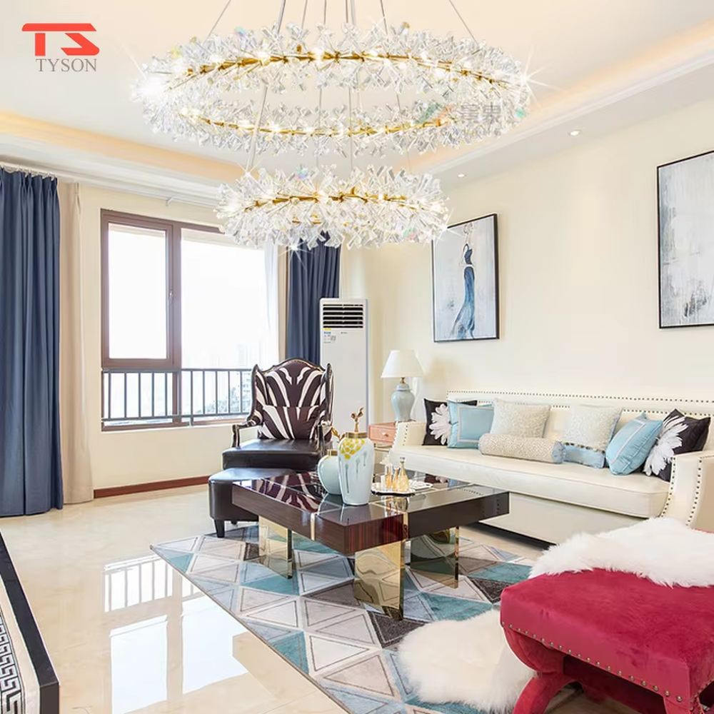 This modern light luxury two-layer circular chandelier features a gold metal frame, inlaid with transparent snowflake-shaped crystal modules, combined into a two-layer staggered circular shape. When lit, light refracts through the crystal to emit a brilliant and soft glow, combining an ethereal feel with an ambient atmosphere. Ideal for living rooms, dining rooms, light luxury apartments, and other spaces, it adds a dreamy and exquisite touch to modern minimalist or French light luxury home environments.