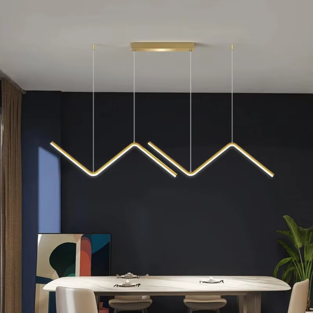 Modern minimalist mountain-shaped linear chandelier, featuring a gold metal frame paired with LED light strips to create staggered mountain contour lines. It emits soft and even light, combining design sense and ambiance, making it a decorative lighting fixture that elevates the space's style.
