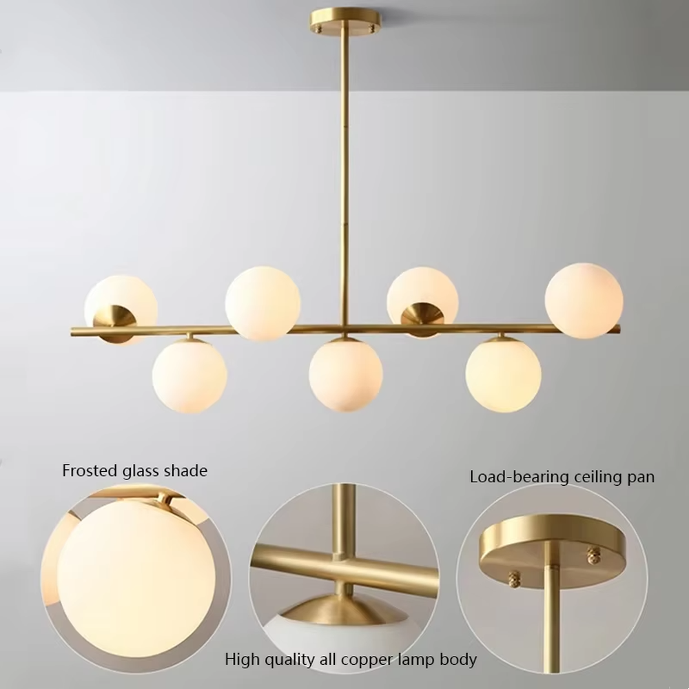 This modern minimalist linear magic bean chandelier features a gold metal frame and multiple milky white frosted glass ball lampshades, arranged in a staggered layout. When lit, it emits soft and even light, combining minimalist design with a gentle ambient atmosphere. Ideal for dining rooms, bars, kitchen islands, and other spaces, it adds an exquisite and soft touch to modern minimalist or Nordic-style home environments.