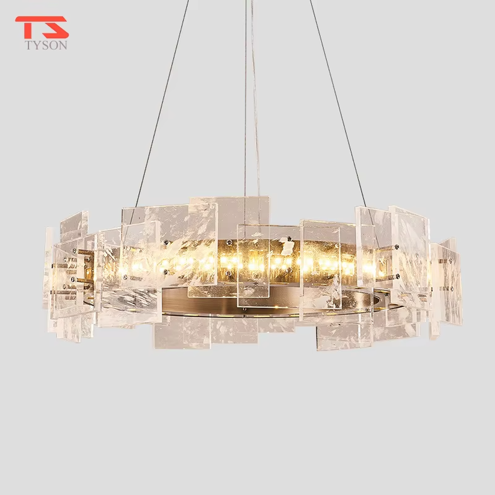 Modern light luxury ice crystal ring chandelier, featuring a gold metal frame paired with staggered ice-crystal textured acrylic panels. Light refracts through the panels to create a brilliant and soft glow, combining luxury texture and artistic ambiance, making it a high-end decorative lighting fixture that elevates the space's style.