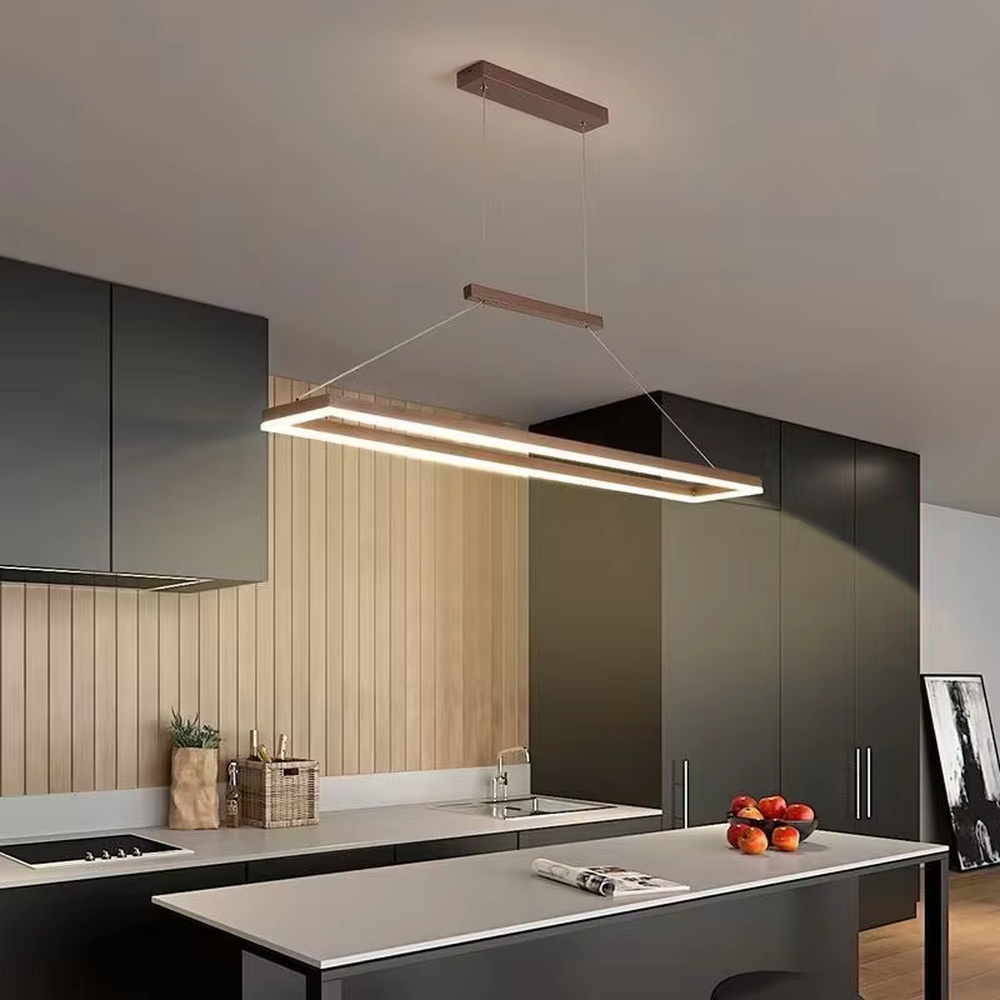 Modern minimalist wood-grain double-layer linear chandelier, featuring a double-layer rectangular frame made of wood-grain metal with built-in soft LED lighting. Its clean and elegant lines combine illumination and decoration, making it a modern home lighting fixture that enhances the space's texture.