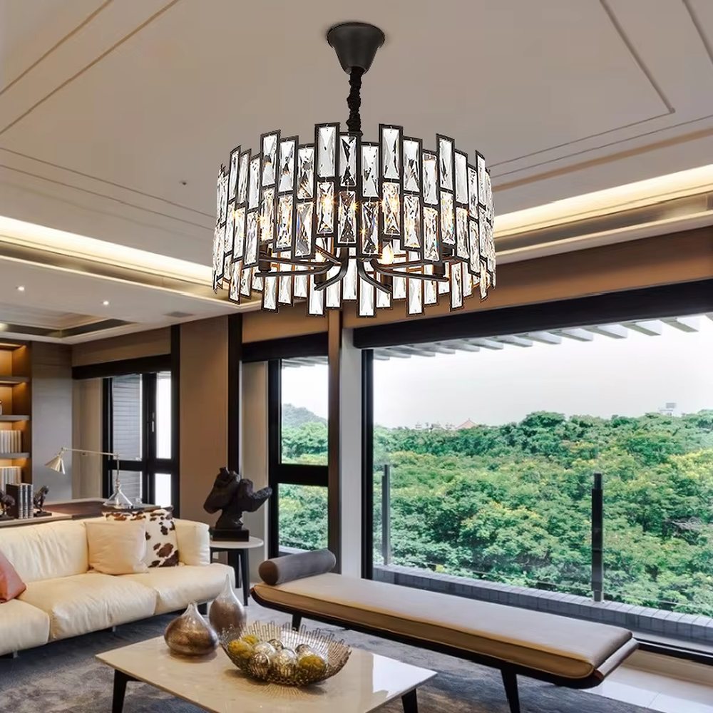 This modern light luxury square crystal chandelier features a black metal frame, inlaid with multi-faceted cut crystal pieces to form a square shape. When lit, light refracts through the crystal to emit a brilliant and luxurious glow, combining a bold texture with an elegant ambiance. Ideal for living rooms, dining rooms, large apartments, and other spaces, it adds an exquisite and sophisticated touch to modern minimalist or light luxury home environments.