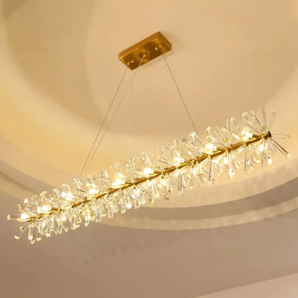 This modern light luxury multi-layer circular chandelier features a gold metal frame, inlaid with transparent snowflake-shaped crystal modules, combined into a three-layer staggered circular shape. When lit, light refracts through the crystal to emit a brilliant and soft glow, combining an ethereal feel with an ambient atmosphere. Ideal for living rooms, dining rooms, light luxury apartments, and other spaces, it adds a dreamy and exquisite touch to modern minimalist or French light luxury home environments.