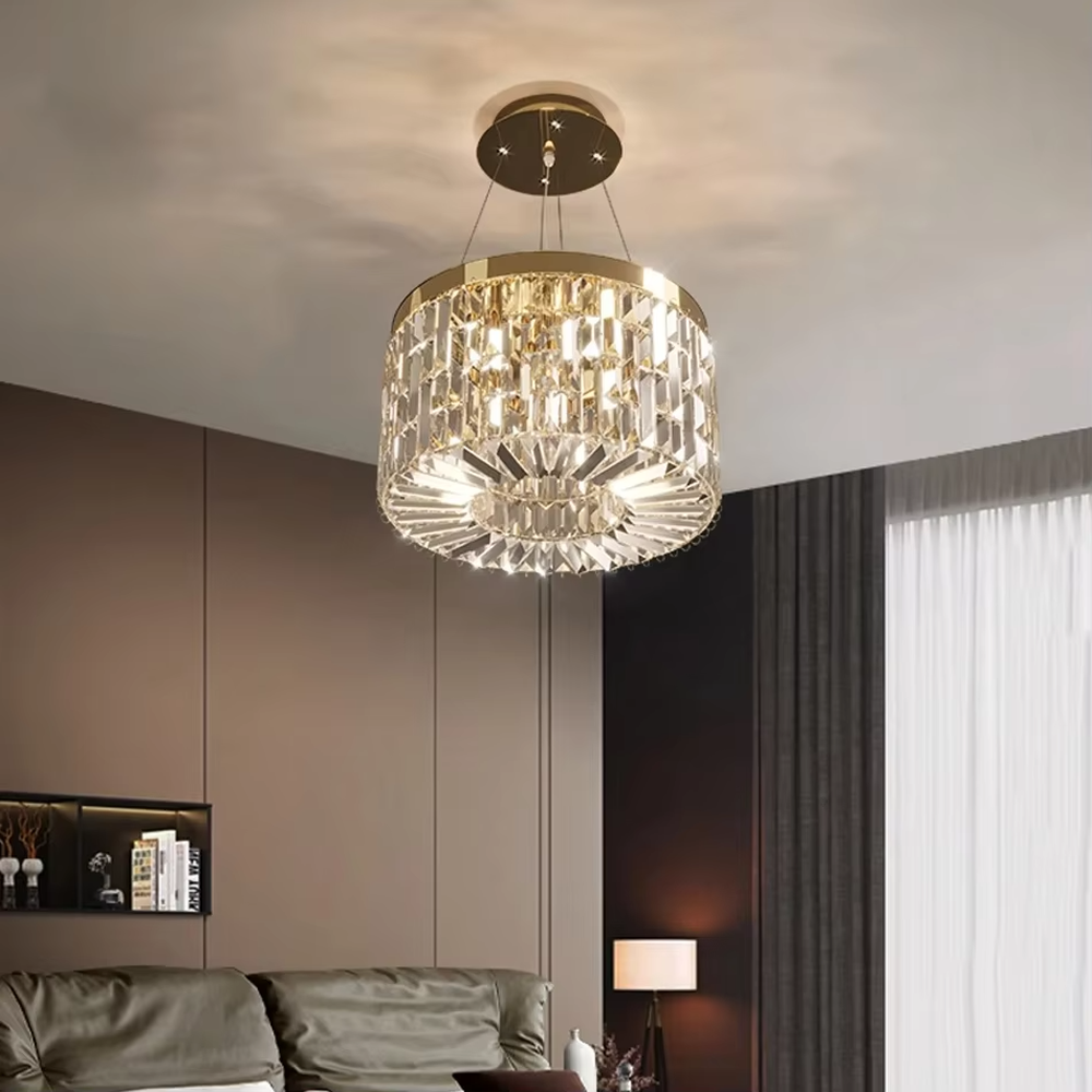 This modern light luxury two-layer circular crystal chandelier features a gold metal frame, inlaid with transparent long crystals to form a double-layered circular shape. When lit, light refracts through the crystal to emit a brilliant and soft glow, combining an exquisite texture with an ambient atmosphere. Ideal for living rooms, dining rooms, light luxury apartments, and other spaces, it adds an exquisite and sophisticated touch to modern minimalist or light luxury home environments.