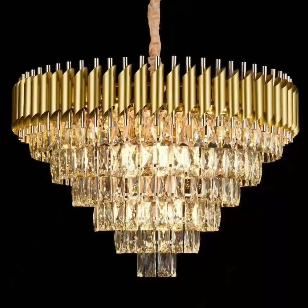 This European luxury multi-layer conical crystal chandelier features an upper frame of gold metal strips and a lower layer of multiple tiers of transparent crystal strips, forming a full conical dome shape. When lit, light refracts through the crystal to emit a brilliant and luxurious glow, combining a luxurious texture with an ambient atmosphere. Ideal for villa living rooms, hotel lobbies, high-end clubs, and other spaces, it adds an elegant and exquisite touch to European luxury or modern light luxury environments.